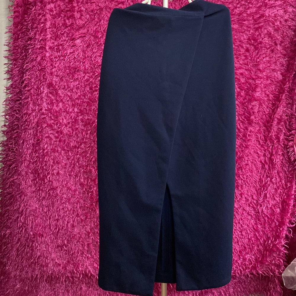 - Another story size small, navy blue skirt -